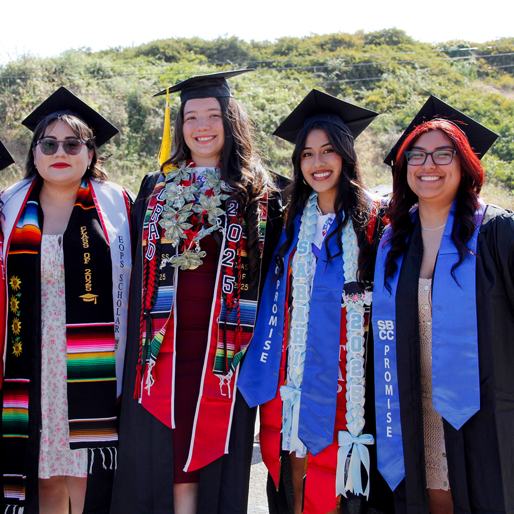 SBCC Promise graduates posing for a photo with other graduates